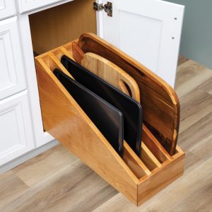 Kitchen featuring Bertch cabinetry with board pullout detail